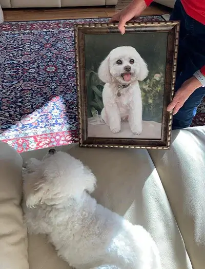 A client's excited reaction to receiving their pet portrait, highlighting its amazing quality.
